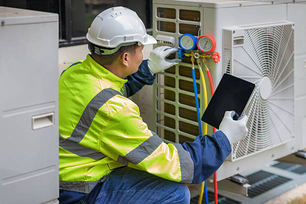 Professional Air Conditioning Repair technician working in Godwin, NC